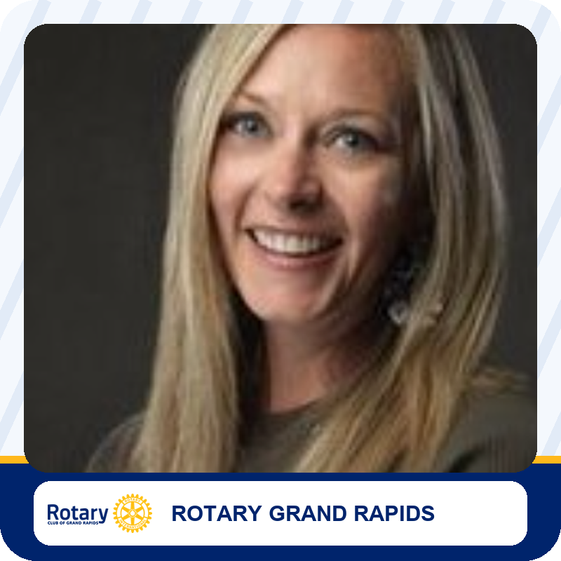 chelsea-dubey Portrait of a smiling woman with long blonde hair, associated with Rotary Grand Rapids